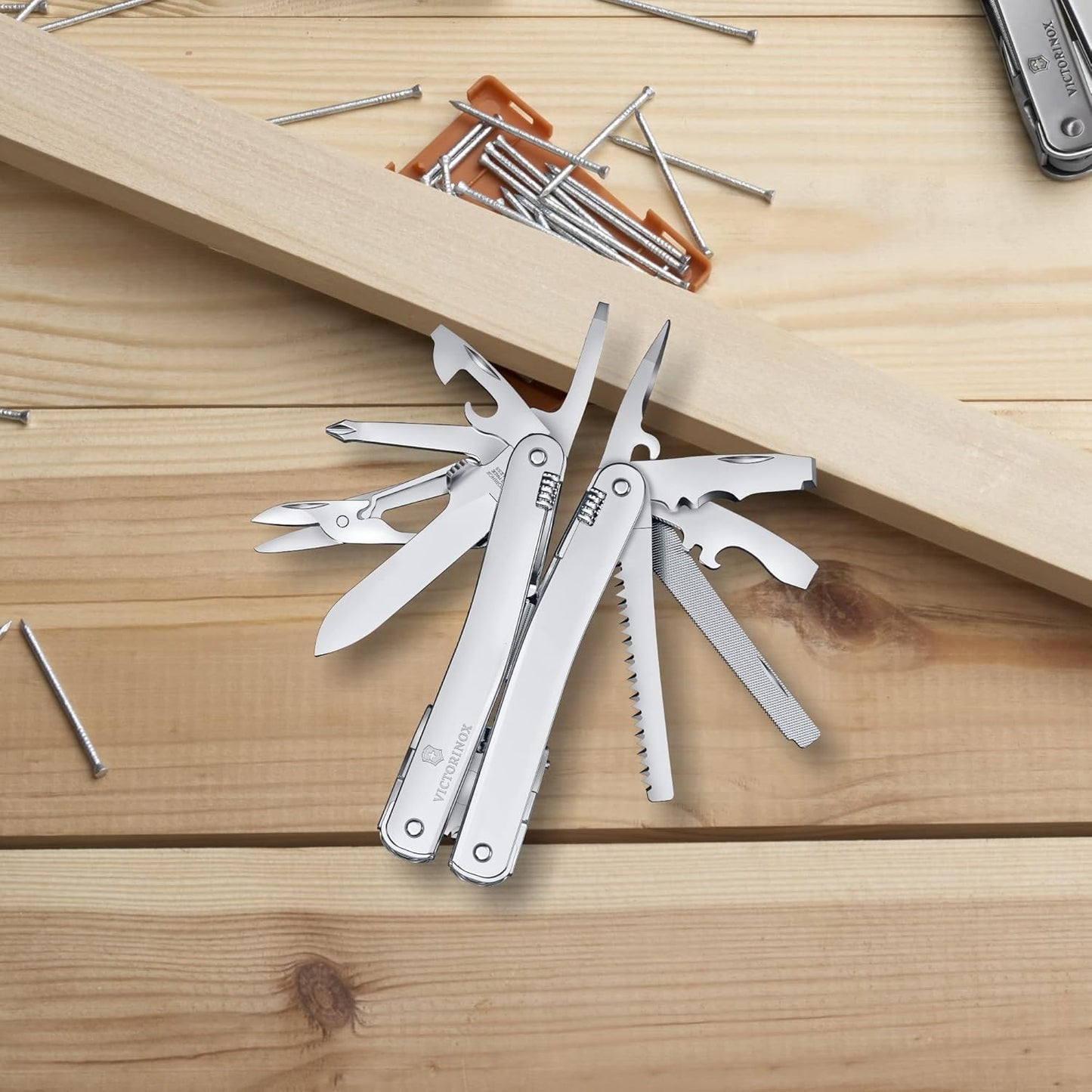 Victorinox Swiss Tool Spirit MX Swiss Army Knife, 24 Function Swiss Made Multitool with Large Blade, Pliers and Wire Cutter - Silver with Nylon Pouch
