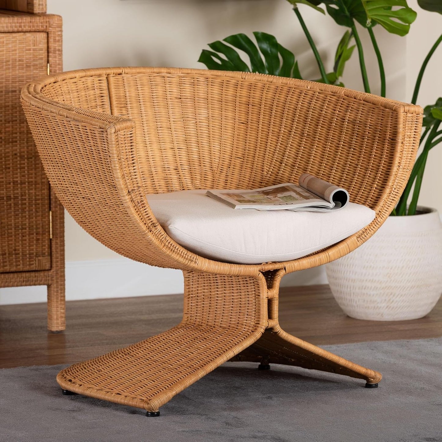 Bali & pari Reya Natural Rattan Lounge Chair - Handwoven Wicker Accent Seating with Pedestal Base for Modern Boho, Coastal, or Tropical Living Room Spaces